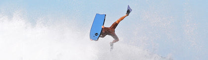 Bodyboarder flipping on SoftTech bodyboard.